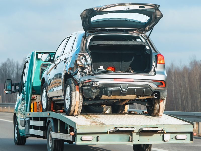 Breakdown vehicle loaded onto tow truck